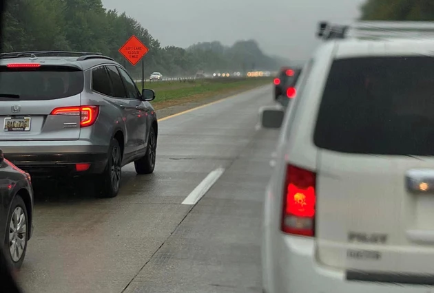 With nearly a mile to go before the merge point on I-96 this driver has completely blocked the left lane. | Jason Vanderstelt | Facebook 